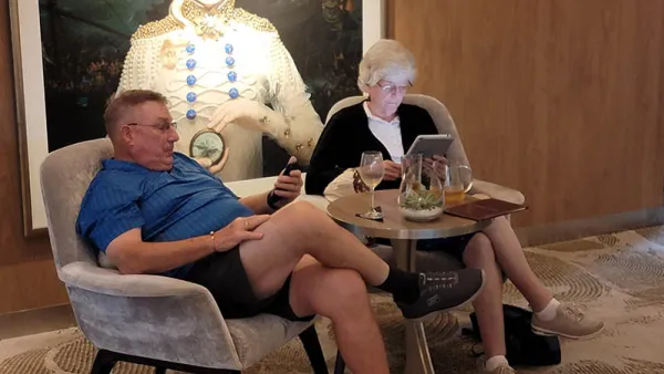 Two Guests Enjoying Cafe al Bacio, the Coffee Shop on Celebrity Edge