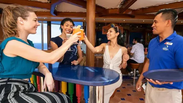 friends at a bar on carnival cruise ship