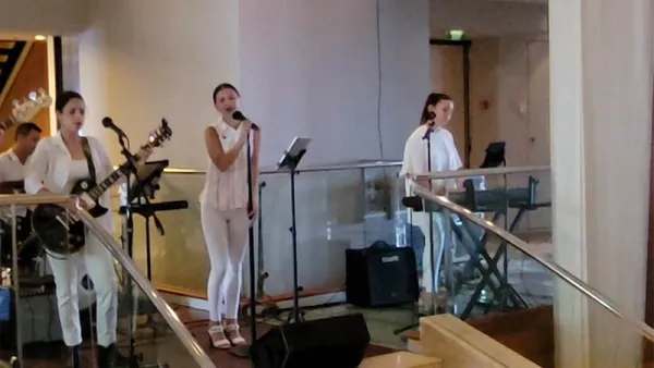 Magnifica playing in the atrium on Celebrity Millennium